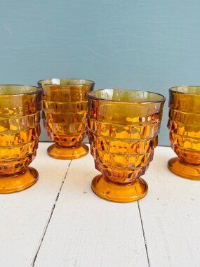 Vintage MCM set of four amber Indiana Glass Whitehall footed juice glasses